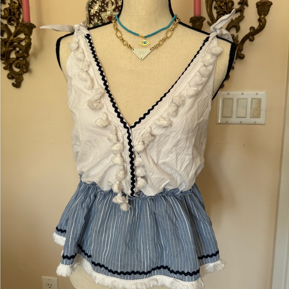 Flirty pom pom top